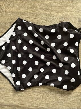 Women’s Black & White Polka Dot one piece swim suit. Never been worn.